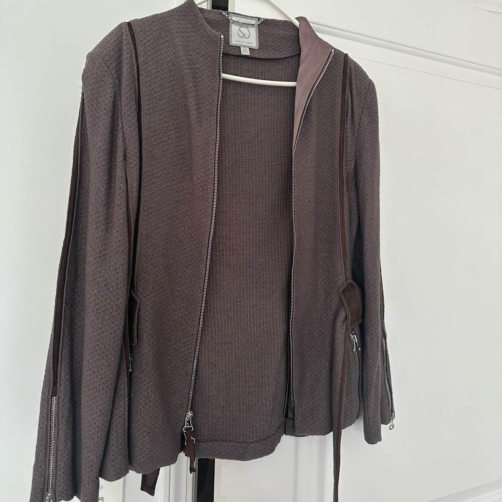 St John Couture size 12  in good preloved condition .Has plenty of life .